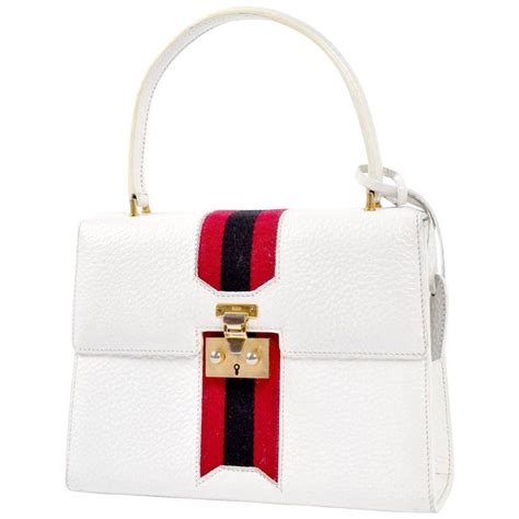 gucci hise|white gucci handbag.